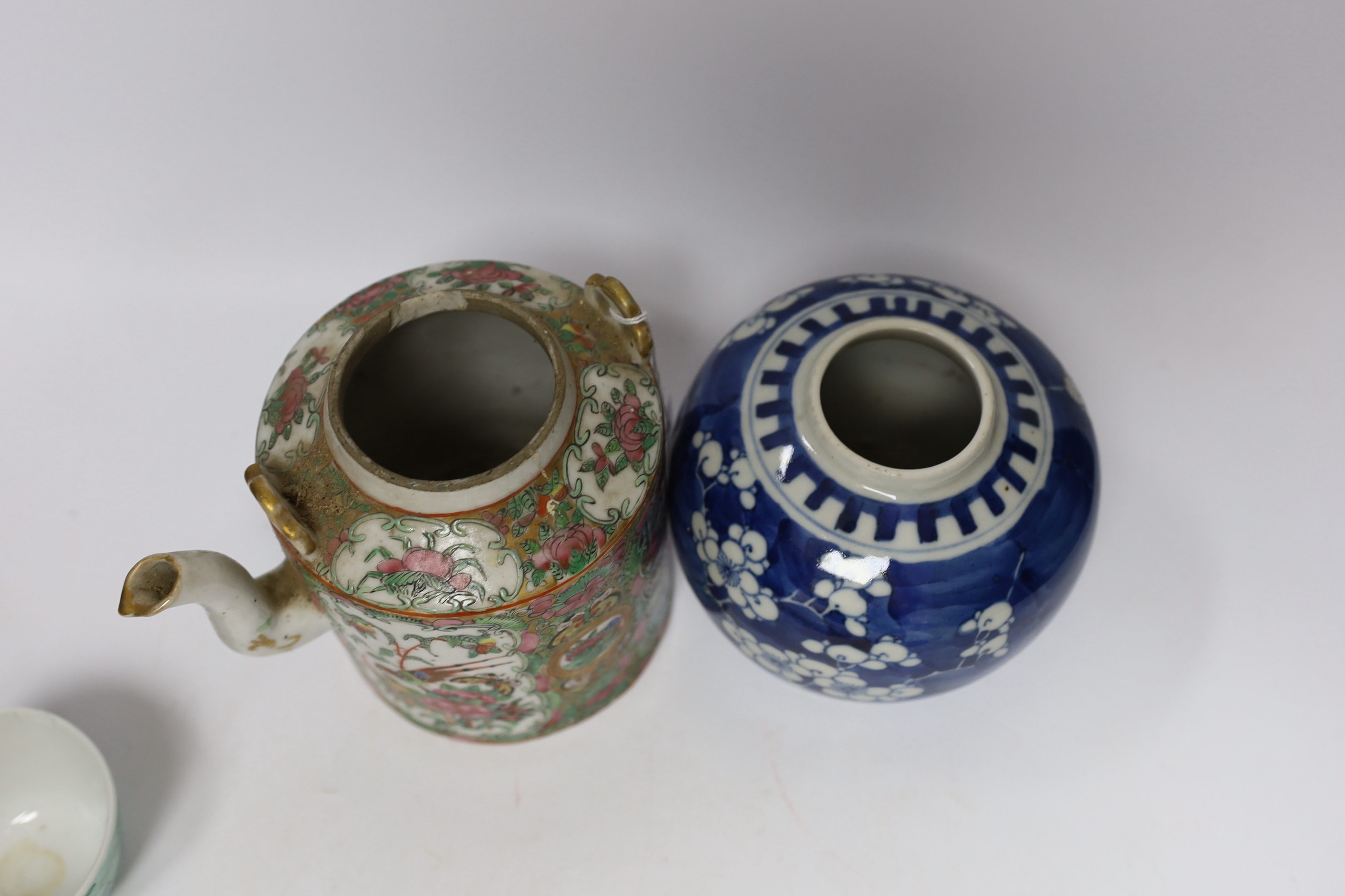 A collection of Chinese ceramics including a blue and white prunus flower jar, a famille rose teapot and a turquoise ground tea bowl, largest 13.5cm high